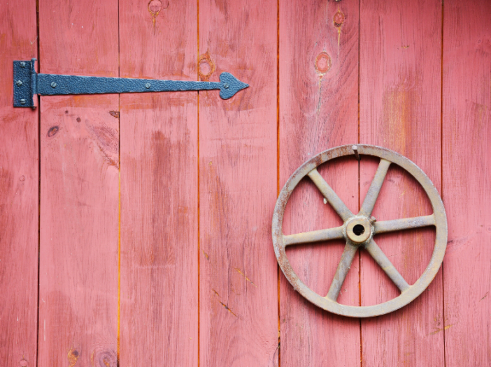 barn door hinge on red door