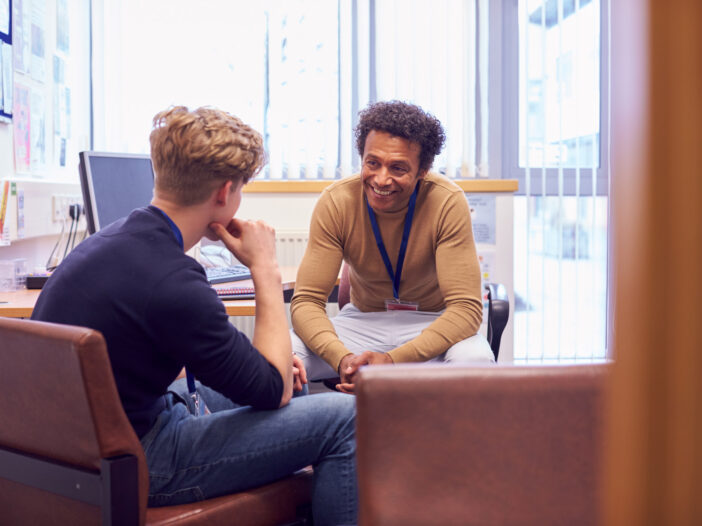 Two men talking